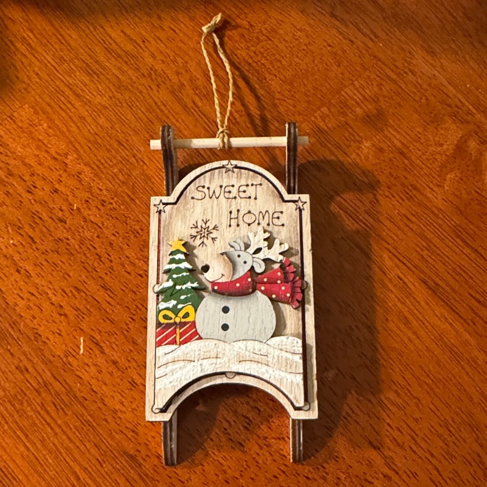 Festive Wooden Sled Ornament with Snowman and Tree